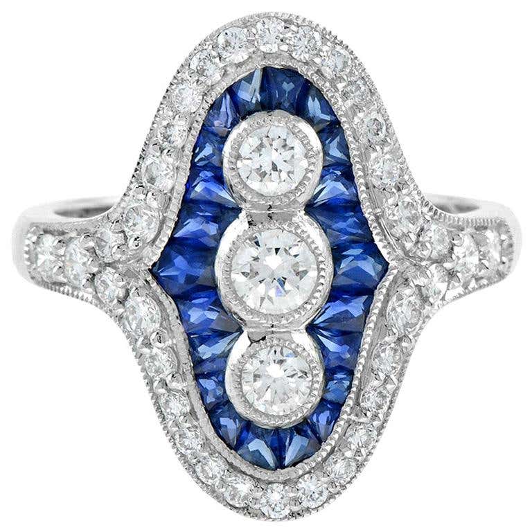 Diamond and French Cut Sapphire Three Stone Dinner Ring