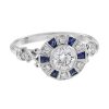 diamond-and-sapphire-halo-engagement-ring-14k-gold-angled-view Diamond and Blue Sapphire Art Deco Style Target Engagement Ring