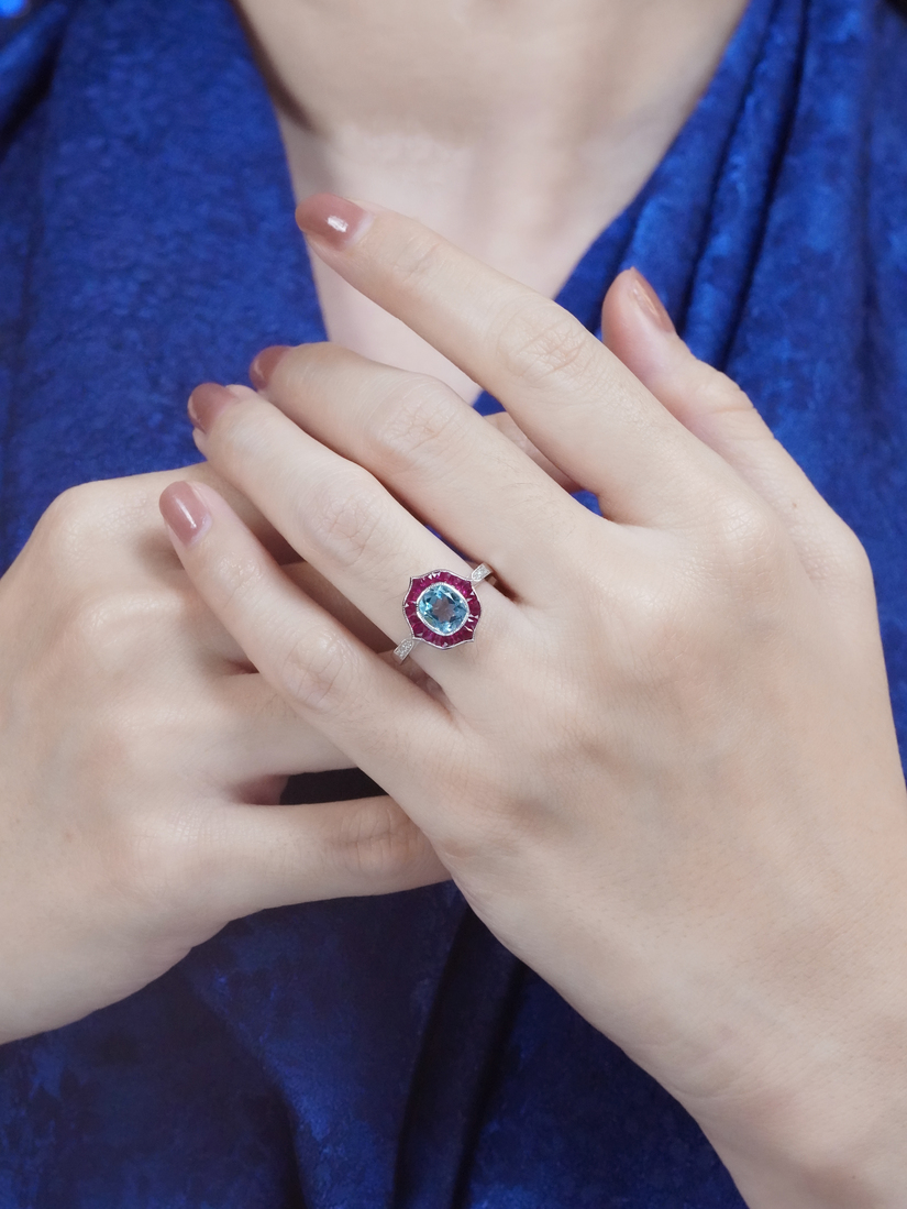 Cushion Blue Topaz Ruby and Diamond Engagement Ring on Body Front Distant blue topaz ruby and diamond ring 14k gold on body distant