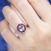 Cushion Blue Topaz Ruby and Diamond Engagement Ring on Body Front Near blue topaz ruby and diamond ring 14k gold on body front near