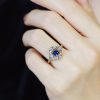 ceylon-sapphire-diamond-engagement-ring-on-body-near-front Ceylon Sapphire and Diamond Engagement Ring on Body Near Front