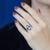 marquise-aquamarine-and-sapphire-engagement-ring-on-body-front-distant Marquise Aquamarine Sapphire and Diamond Engagement Ring on Body Distant