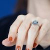 marquise-aquamarine-and-sapphire-engagement-ring-on-body-side-distant Marquise Aquamarine Sapphire and Diamond Engagement Ring on Body Side Distant