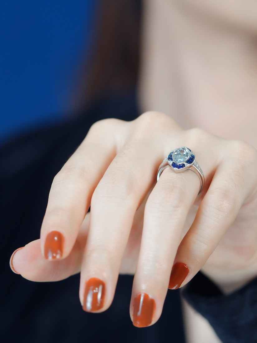 marquise-aquamarine-and-sapphire-engagement-ring-on-body-side-distant Marquise Aquamarine Sapphire and Diamond Engagement Ring on Body Side Distant