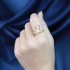 Marquise Emerald and Diamond Snake Statement Ring in Solid Gold on Body Front Face Distant Marquise Emerald and Diamond Snake Statement Ring in Solid Gold by Lilly M. JEWELERS on Body Front Distant