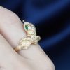 Marquise Emerald and Diamond Snake Statement Ring in Solid Gold on Body Side Near Marquise Emerald and Diamond Snake Statement Ring in Solid Gold by Lilly M. JEWELERS on Body Side Near