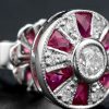 Round Diamond and Ruby Stud Earrings Detail round diamond ruby stud earrings 14k gold detail