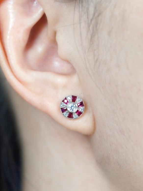 Round Diamond and Ruby Stud Earrings on Body Near round diamond ruby stud earrings 14k gold on body front near