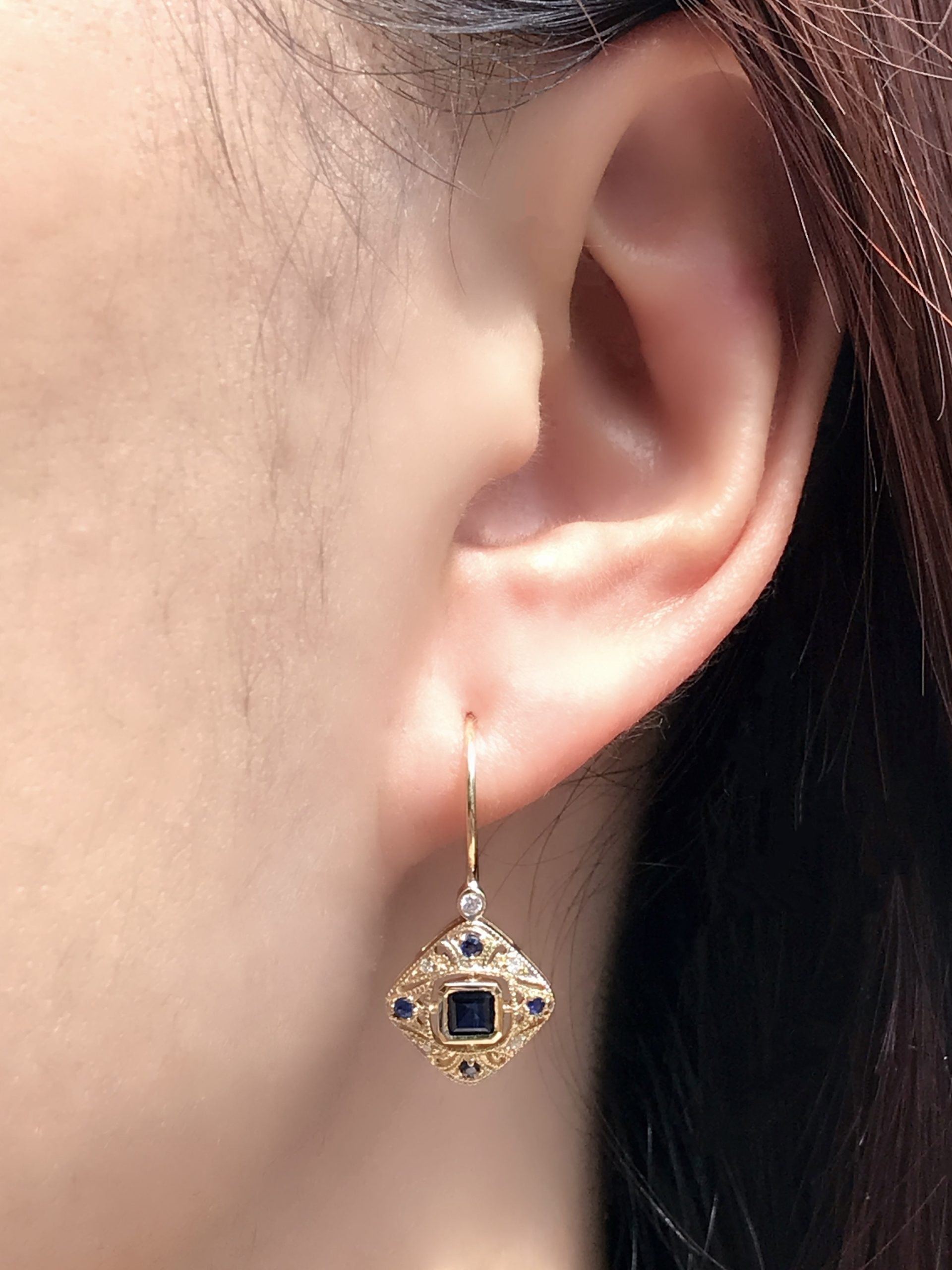 Sapphire and Diamond Drop Earrings On Body Distant