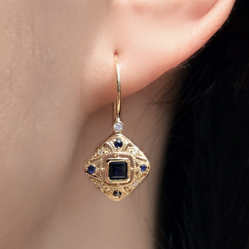 Sapphire and Diamond Drop Earrings On Body Near