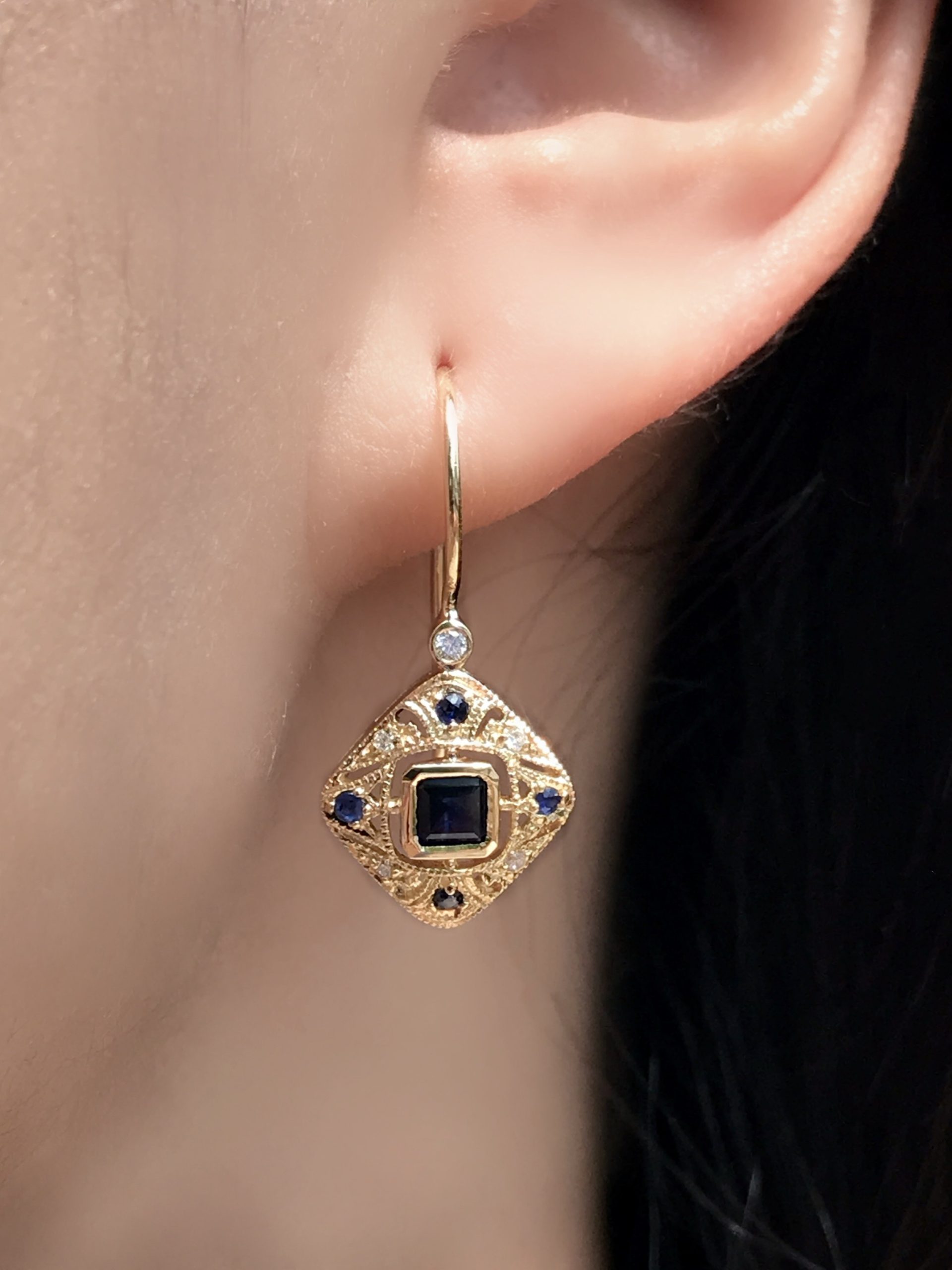 Sapphire and Diamond Drop Earrings On Body Near