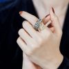 Sapphire Emerald Ruby and Diamond Statement Ring on Body Front Distant sapphire ruby emerald diamond statement ring 14k gold on body front distant
