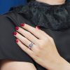 aquamarine-sapphire-diamond-engagement-ring-14k-white-gold-on-body-distant Aquamarine and Blue Sapphire Engagement Ring on Body Front Distant