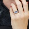 aquamarine-sapphire-diamond-engagement-ring-14k-white-gold-on-body-front Aquamarine and Blue Sapphire Engagement Ring on Body Front