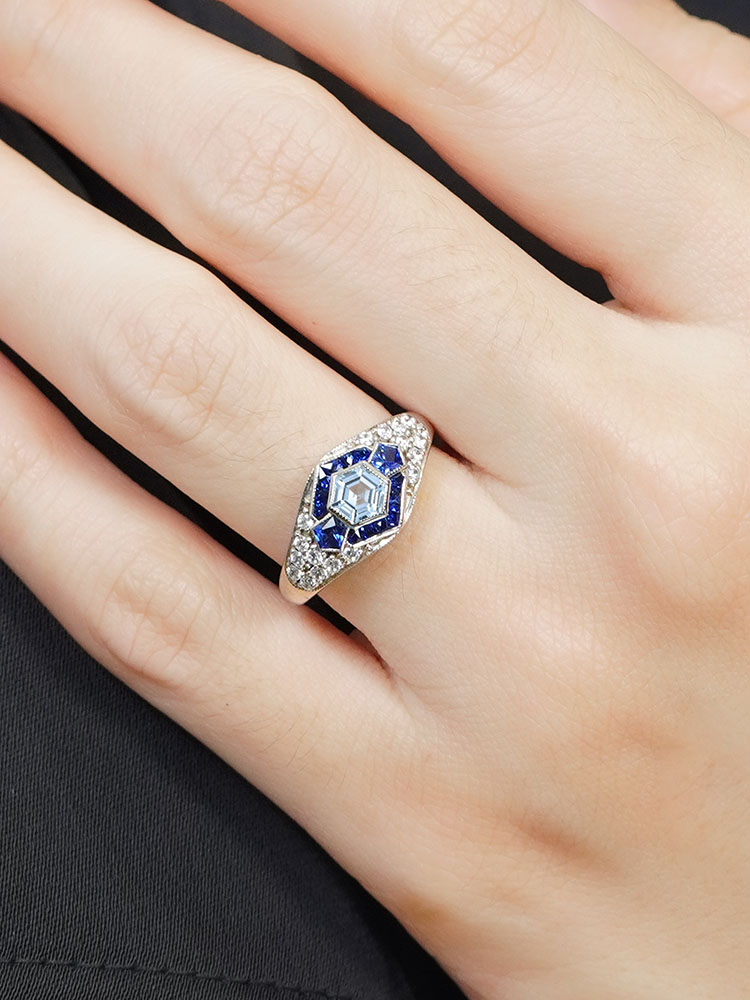 Aquamarine and Blue Sapphire Engagement Ring on Body Front Near