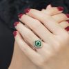 asscher-cut-emerald-diamond-engagement-ring-art-deco-style-14k-gold-on-body-front-near Emerald Cut Emerald Art Deco Style Ring on Body Front Near
