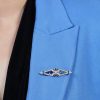 blue-sapphire-and-diamond-geomatric-art-deco-style-brooch-14k-gold-on-body-distant Blue Sapphire and Diamond Brooch on Body Distant