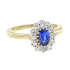 ceylon-sapphire-diamond-halo-engagement-ring-18k-yellow-gold-angled-view Ceylon Sapphire Diamond Halo Engagement Ring Angled View