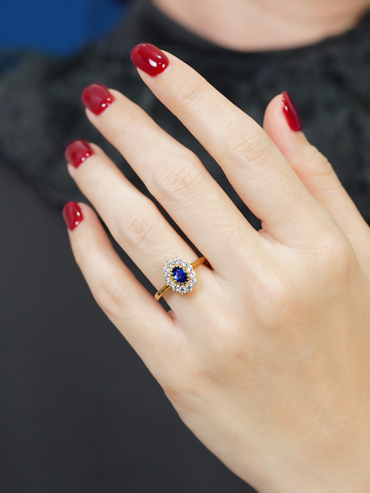 ceylon-sapphire-diamond-halo-engagement-ring-18k-yellow-gold-on-body-front-near Ceylon Sapphire Diamond Halo Engagement Ring on Body Front Near