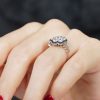 diamond-cluster-blue-sapphire-ring-art-deco-18k-white-gold-on-body-side-near Diamond Cluster and Blue Sapphire Art Deco Style Ring