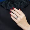 diamond-sapphire-halo-ring-art-deco-style-14k-white-gold-on-body-front-distant' Diamond and Sapphire Art Deco Style Halo Ring on Body Front Distant