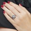 diamond-sapphire-halo-ring-art-deco-style-14k-white-gold-on-body-front-near Diamond and Sapphire Art Deco Style Halo Ring on Body Front Near