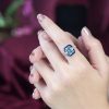 emerald-cut-blue-topaz-sapphire-diamond-ring-art-deco-style-14k-gold-on-body-distant Emerald Cut Blue Topaz Art Deco Style Ring on Body Distant