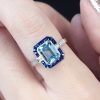 emerald-cut-blue-topaz-sapphire-diamond-ring-art-deco-style-14k-gold-on-body-near Emerald Cut Blue Topaz Art Deco Style Ring on Body Near