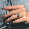 round-diamond-emerald-sapphire-target-ring-art-deco-style-18k-gold-on-body-distant Diamond Emerald Sapphire Art Deco Style Ring on Body Distant