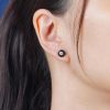 round-diamond-onyx-stud-earrings-art-deco-style-14k-white-gold-on-body-front-near Diamond Onyx Art Deco Style Stud Earrings on Body Front Near