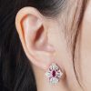 ruby-diamond-geometric-stud-earrings-18k-white-gold-on-body-front-near Ruby Diamond Geometric Stud Earrings Front Near