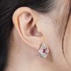 ruby-diamond-geometric-stud-earrings-18k-white-gold-on-body-side-near Ruby Diamond Geometric Stud Earrings Side Near
